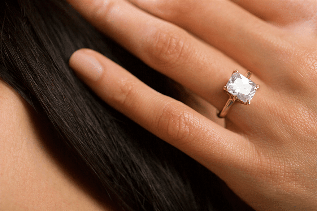 diamond engagement ring on a woman's hand